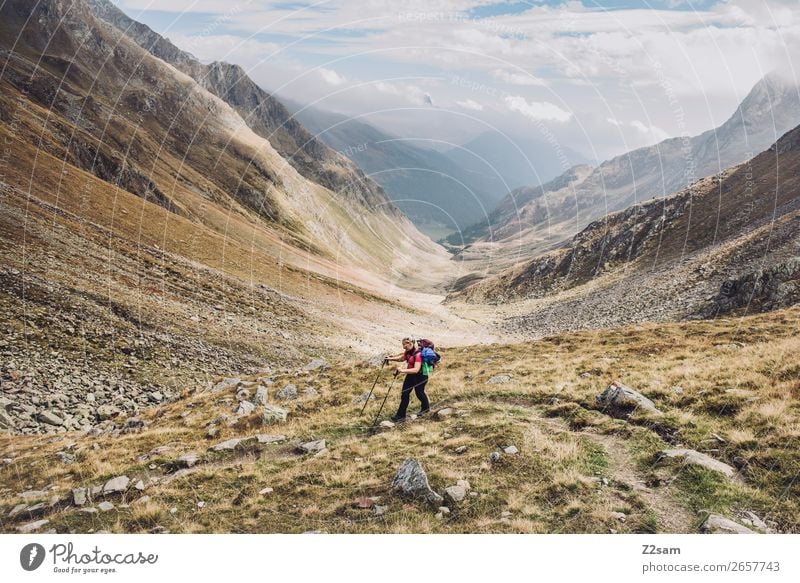 Young woman descending into Timmelstal | E5 Leisure and hobbies Adventure Hiking Youth (Young adults) 18 - 30 years Adults Nature Landscape Sky Clouds Autumn