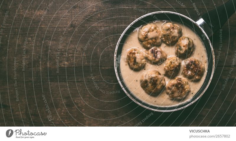 Homemade swedish chicken traditional meatballs in pan on dark rustic wooden background, top view with copy space homemade sauce cooked food dinner lunch beef