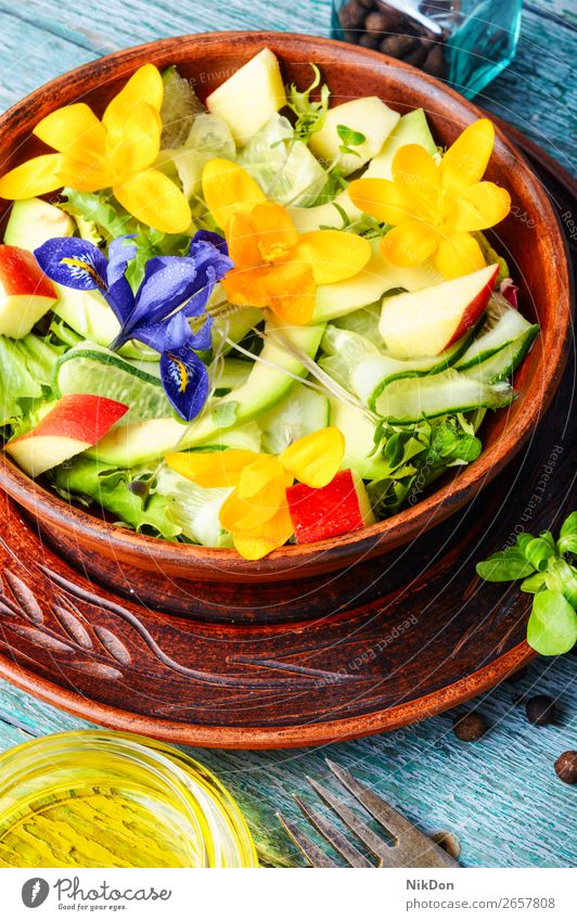 Fresh vegan salad with edible flowers food healthy fresh green diet vegetarian vegetable dish spring organic herb lettuce plate herbal mixed bowl summer leaf