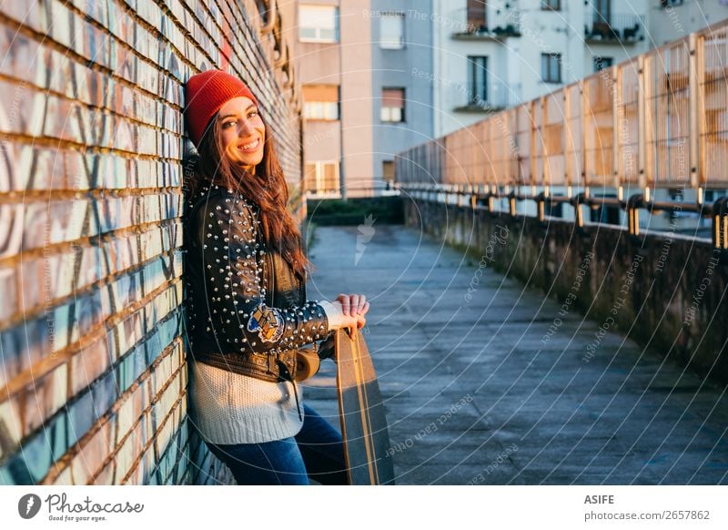 Skater woman at sunset enjoying the sun Lifestyle Style Joy Happy Beautiful Leisure and hobbies Winter Sports Woman Adults Youth (Young adults) Culture Autumn