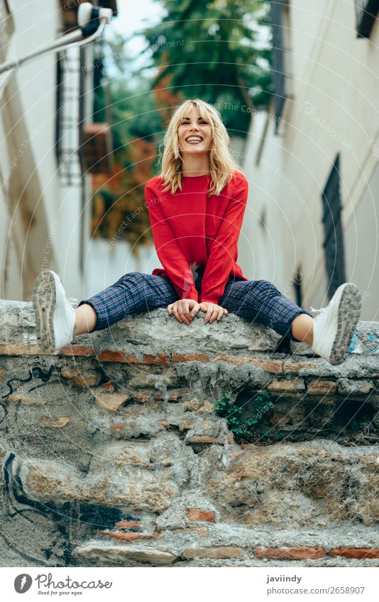 Smiling blonde girl with red shirt enjoying life outdoors. Lifestyle Style Happy Beautiful Hair and hairstyles Human being Feminine Young woman