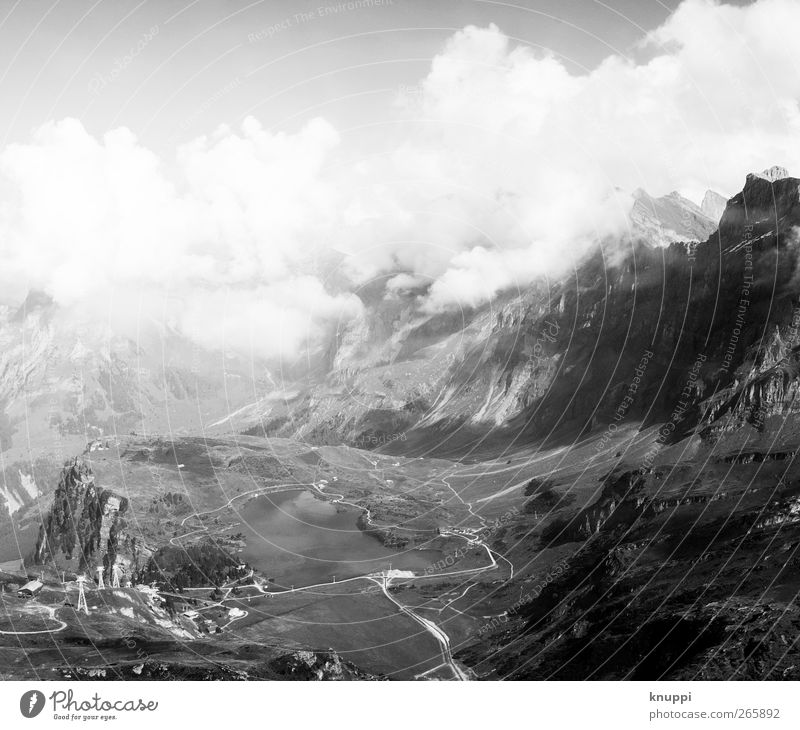 Heidiland Environment Nature Landscape Air Sky Clouds Sunrise Sunset Sunlight Summer Beautiful weather Alps Mountain Peak Hiking Gigantic Infinity Wild Gray