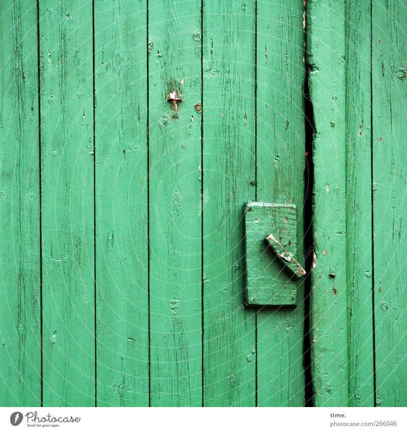 crafted Locking mechanism Closure Hut Door Wood Dirty Simple Green Uniqueness Precision Calm Moody Decline Change Farm Agriculture Barn Colour photo