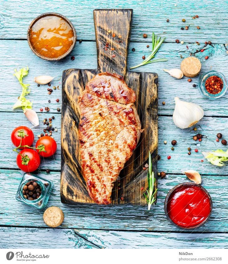 Sirloin beef steak meat food grilled sauce ketchup rosemary barbecue roasted beefsteak sirloin pepper peas spices garlic fillet bbq tenderloin table eating