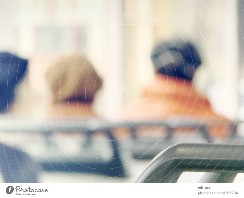 Blurred persons in public transport Commute Means of transport Passenger traffic Human being Adults 3 Train travel Bus travel Commuter trains Tram Hat Cap