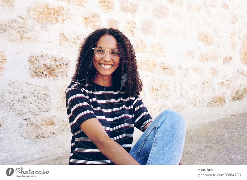 A portrait of happy smiling young woman Lifestyle Style Happy Beautiful Hair and hairstyles Calm Student Human being Feminine Young woman Youth (Young adults)