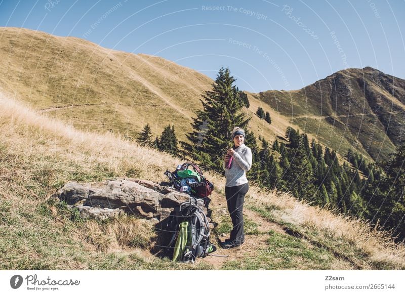 Young hiker takes a break on the way to Hirzer Leisure and hobbies Vacation & Travel Hiking Climbing Mountaineering Young woman Youth (Young adults)