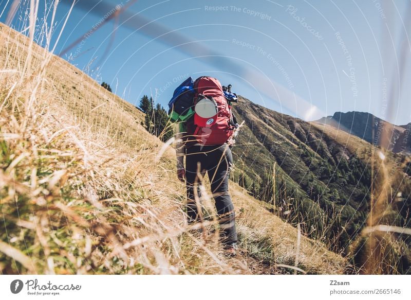 Young woman on the E5 long-distance hiking trail towards Hirzer Leisure and hobbies Vacation & Travel Hiking Climbing Mountaineering Youth (Young adults)