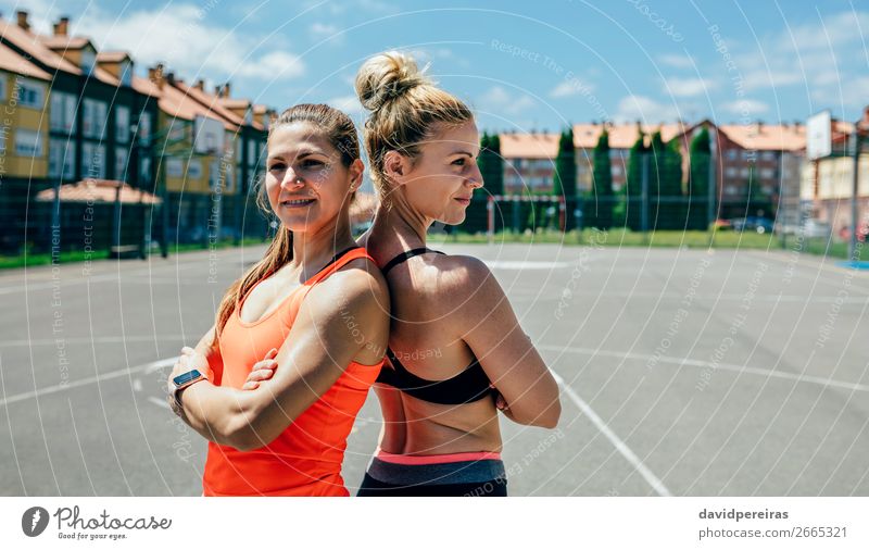 Sportswomen posing with crossed arms Lifestyle Happy Beautiful Personal hygiene Human being Woman Adults Friendship Piercing Brunette Blonde Fitness Smiling