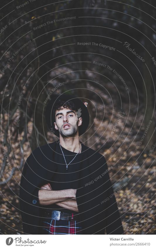 A Young Man standing in the woods Lifestyle Elegant Style Exotic Human being Masculine Androgynous Young man Youth (Young adults) Adults 1 Environment Nature