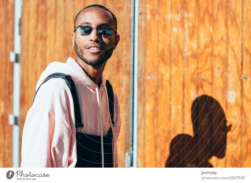 Young black man wearing casual clothes and sunglasses outdoors Lifestyle Happy Beautiful Human being Masculine Young man Youth (Young adults) Man Adults 1