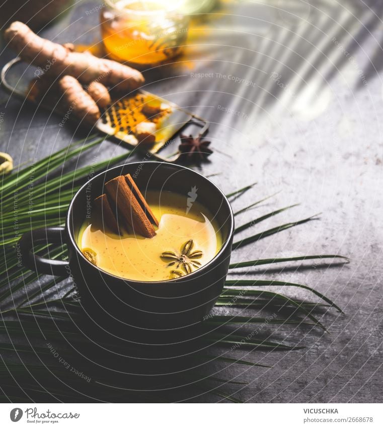 Cup of golden turmeric milk with spices Food Herbs and spices Nutrition Organic produce Diet Beverage Hot drink Milk Tea Style Design Healthy Health care