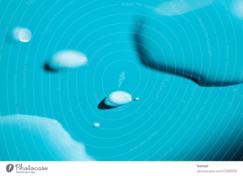 A blue lagoon Flat (apartment) Table Drops of water water forms Puddle pool Water Wet Blue Turquoise Fluid Colour photo Interior shot Close-up Detail Deserted