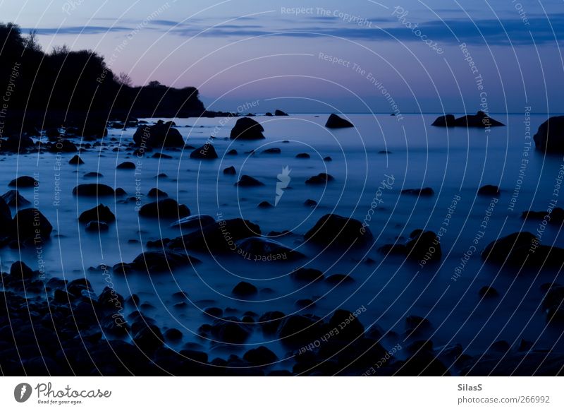 Baltic Bay Baltic Sea Rock Stone Blue Pink Red Black Colour photo Exterior shot Deserted Evening Twilight Long exposure