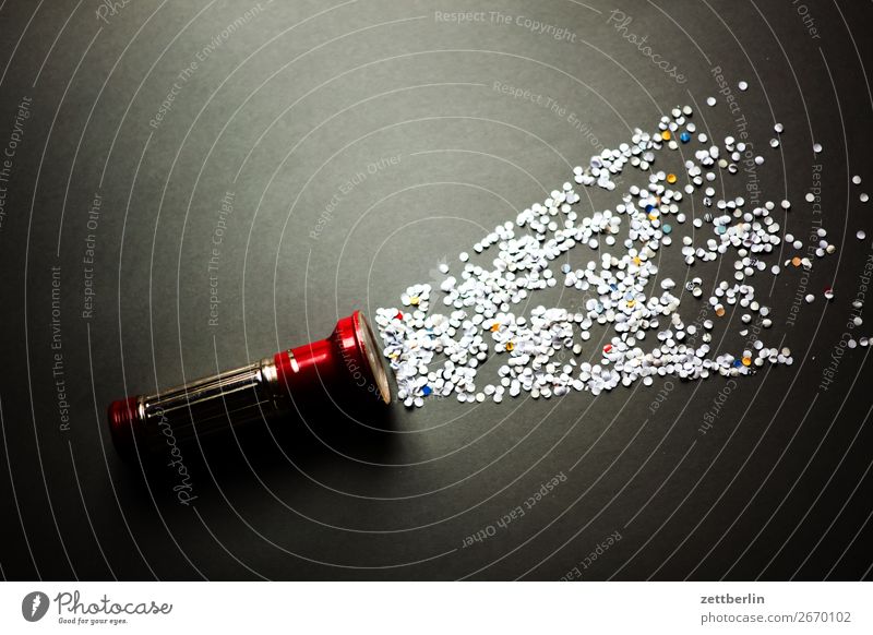 photons Trash Tidy up Dark Invitation Awareness Feasts & Celebrations Birthday Bright Confetti Lamp Light Beam of light Hollow Hole puncher Deserted Pattern