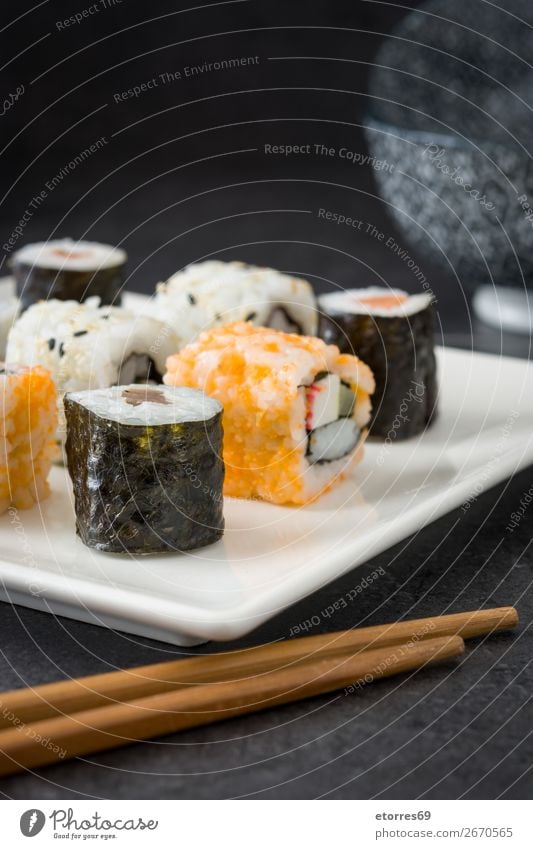 sushi assortment in white plate on black background Sushi Food Healthy Eating Food photograph Japanese Rice Fish Salmon Seafood Roll Meal Make Gourmet Asia Raw