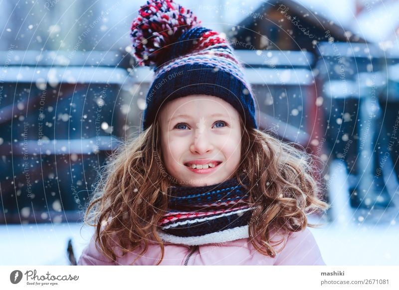 winter portrait of happy child girl playing outdoor Lifestyle Joy Happy Leisure and hobbies Playing Vacation & Travel Winter Snow Garden Christmas & Advent