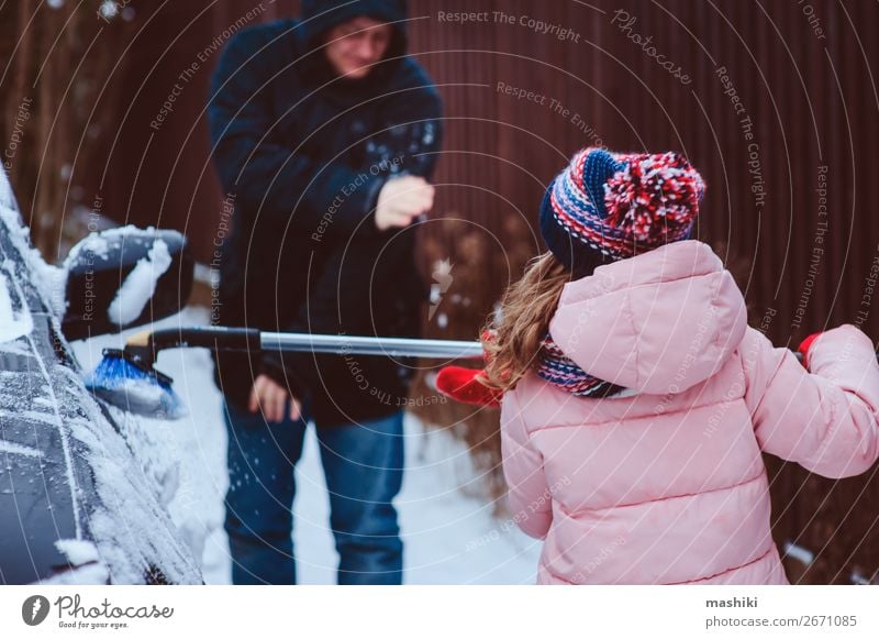 child girl cleaning car from snow with dad Playing Winter Snow Child Tool Father Adults Family & Relations Weather Bad weather Storm Snowfall Transport Street