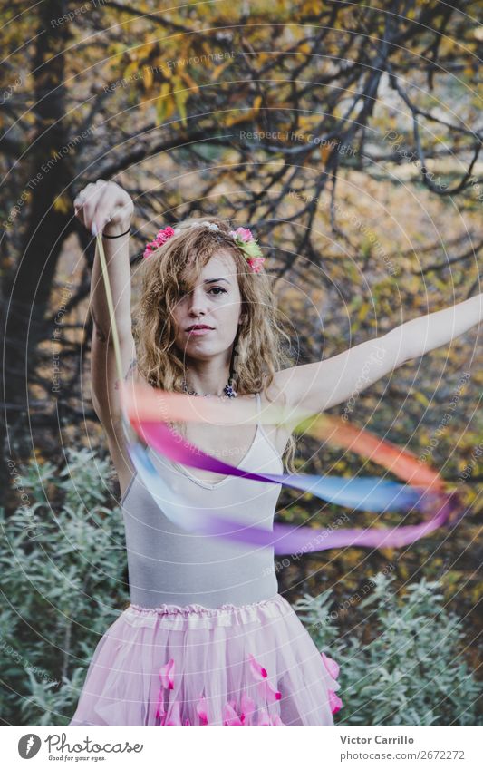 A Young cool Woman Standing and playing in the Woods Lifestyle Elegant Style Design Exotic Human being Feminine Young woman Youth (Young adults) Adults Dance