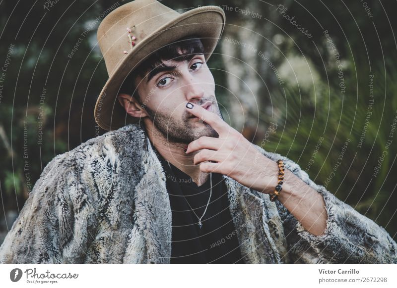 A Young Man standing in the woods Lifestyle Shopping Elegant Style Design Exotic Joy Human being Masculine Feminine Androgynous Homosexual Young man