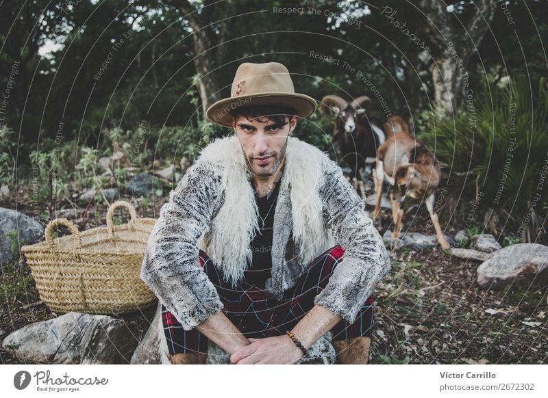 A Young Man standing in the woods Lifestyle Shopping Elegant Style Design Freedom Human being Masculine Androgynous Young man Youth (Young adults) Adults Face 1