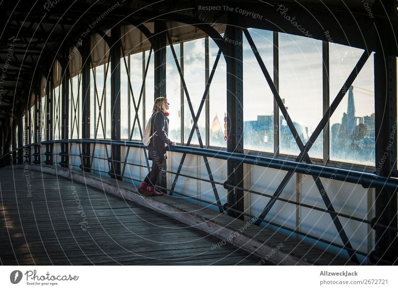 young woman in Hamburg at the landing stages Germany Town Landungsbrücken Day Clouds Beautiful weather Harbour City trip Sightseeing 1 Person Young woman