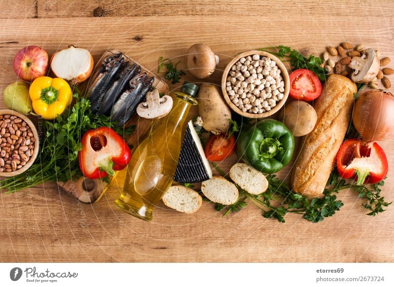 Healthy eating. Mediterranean diet. Fruits and vegetables Diet Healthy Eating Food Food photograph Vegetable Fish Grain Nut Olive Oil Table Wood Vitamin Apple