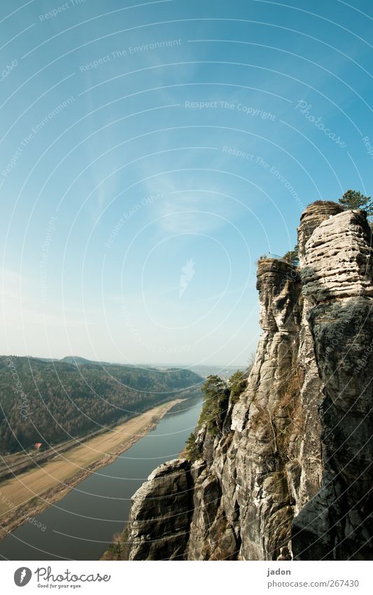 rock and river. Tourism Trip Sightseeing Landscape Sky Beautiful weather Rock Mountain Saxon Switzerland Elbsandstone mountains River bank Elbe