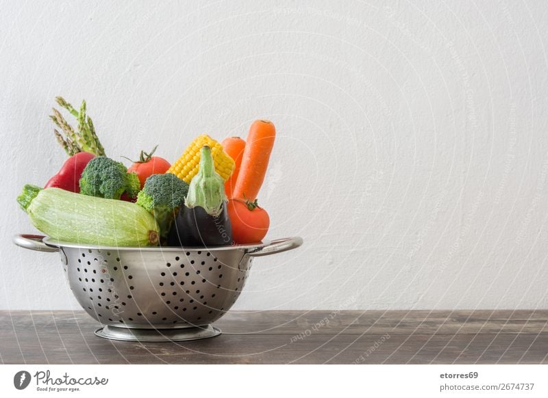 Colander with vegetables on wooden table Diet Healthy Healthy Eating Sieve Food Food photograph Dish Fruit Vegetable Table Wood Vitamin Lettuce Pepper Onion