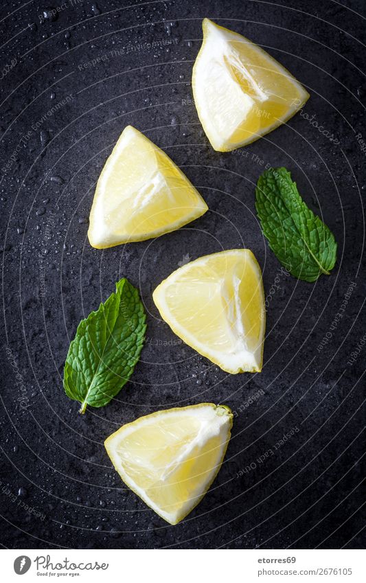 Fresh ripe lemons on dark stone Lemon Fruit Yellow Healthy Healthy Eating Vegetable Food Food photograph Slice Green Juice Juicy Natural Leaf Tropical