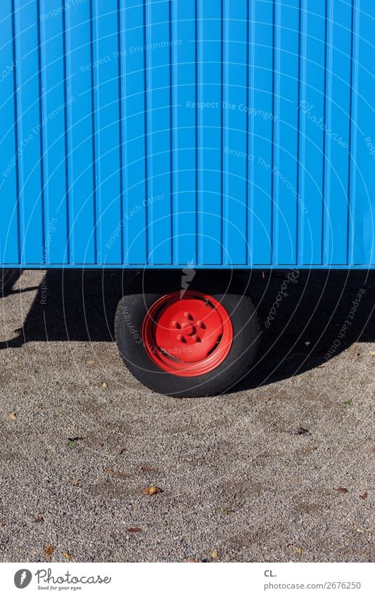 red rim Transport Means of transport Road traffic Lanes & trails Vehicle Site trailer Wheel rim Tire Uniqueness Round Blue Red Colour Mobility Stagnating