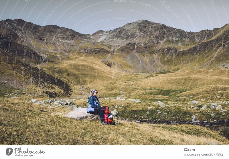 Young woman pauses on crossing the Alps | Südtirol E5 Vacation & Travel Mountain Hiking Youth (Young adults) Nature Landscape Summer Beautiful weather Meadow