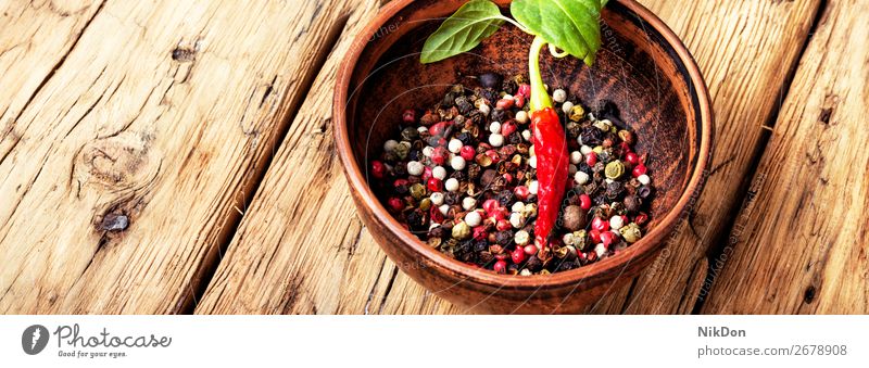 Different kinds of peppercorns. spice mexican ingredient seasoning pea healthy spicy black chili clay bowl vegetable closeup kitchen hot cayenne ripe paprika