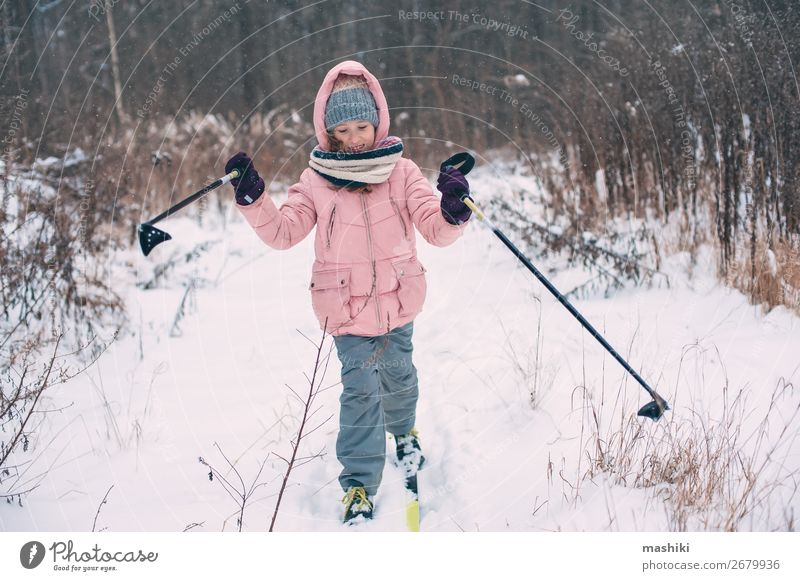 happy child girl skiing in winter snowy forest Leisure and hobbies Vacation & Travel Adventure Winter Snow Winter vacation Skis Child Youth (Young adults)