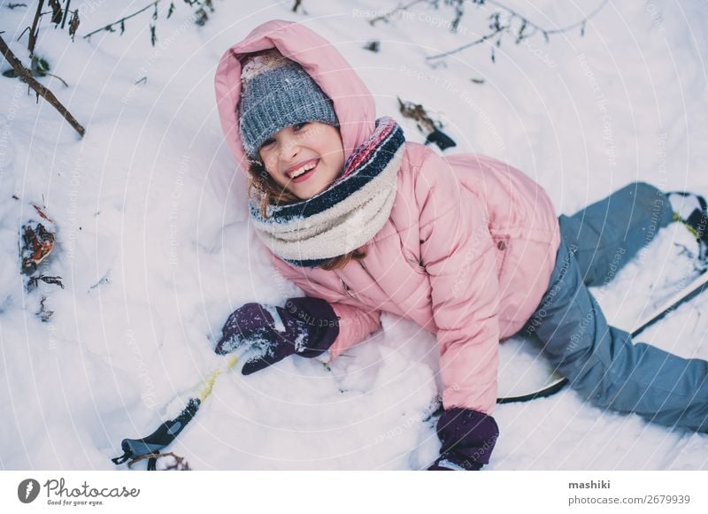 happy child girl skiing in winter snowy forest Joy Leisure and hobbies Vacation & Travel Adventure Winter Snow Sports Child Youth (Young adults) Landscape