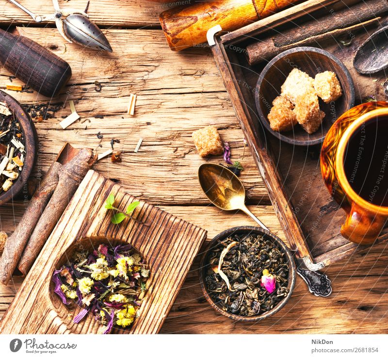 leaves of herbal tea leaf drink cup healthy natural antioxidant bowl sugar cinnamon spice rustic retro dry black aromatic heap freshness fruit tea leaves petal