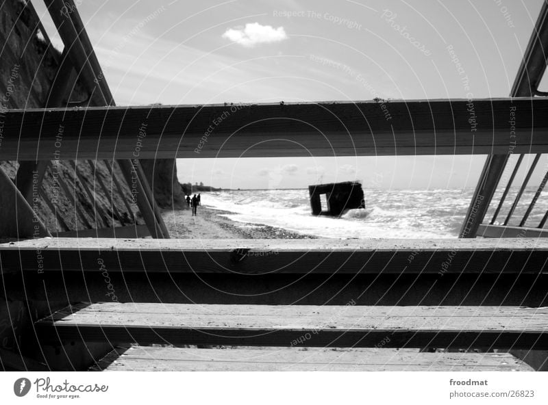 bunker view Ocean Vista Clouds Beach Waves White crest Moody Geometry Cliff Coast Dark Obscure Dugout Baltic Sea Stairs Black & white photo Sand Downward