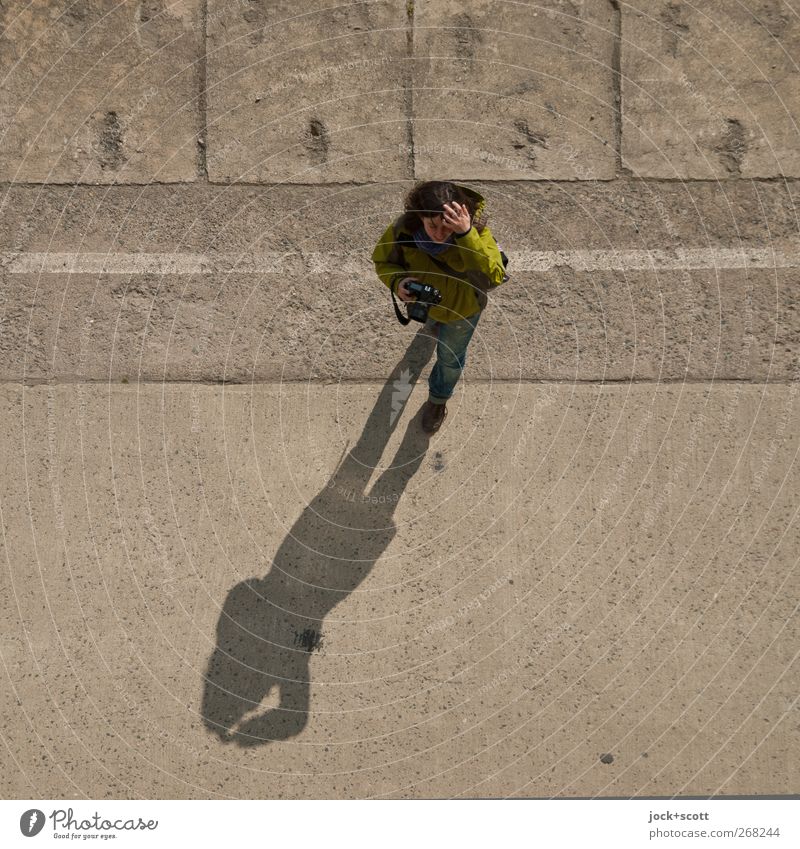 clocking in at 11:35 Leisure and hobbies Take a photo 18 - 30 years Youth (Young adults) Pants Jacket Brunette Long-haired Movement Under Serene Time Camera