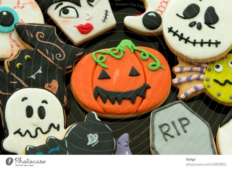 Halloween cookies with different shapes Dessert Plate Joy Face Decoration Table Feasts & Celebrations Hallowe'en Autumn Cat Wood Smiling Creepy Delicious Brown