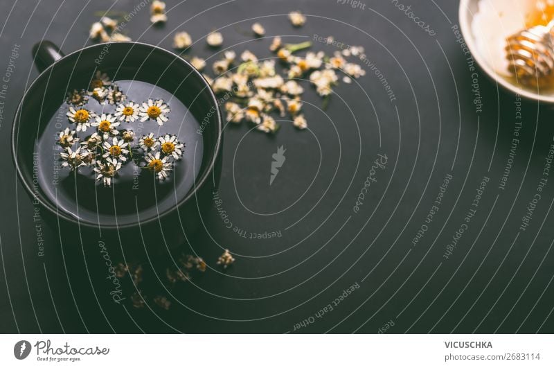 Cup with chamomile tea Food Beverage Hot drink Tea Style Design Healthy Health care Alternative medicine Healthy Eating Nature Yellow Background picture