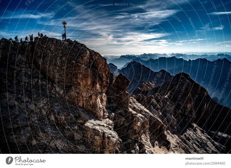 Visitors to the summit of Zugspitze Mountain Hiking Climbing Mountaineering Landscape Sky Beautiful weather Rock Alps Peak Peak cross mountain ranges