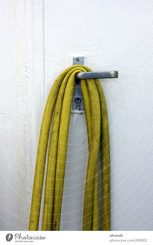 knackered Door Door handle Lock Hose Rubber Metal Dirty Yellow Colour photo Exterior shot Copy Space top