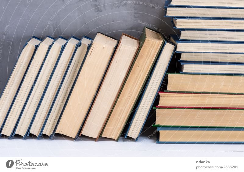 stack of various books on the table Reading Table Science & Research School Classroom Academic studies Book Library Paper Yellow Gray White Wisdom Idea