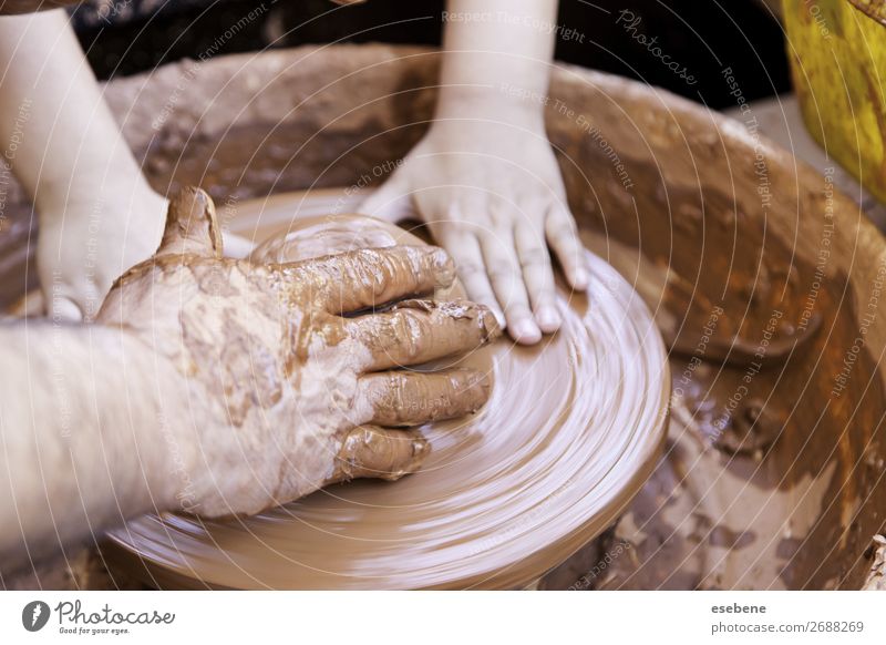 Person working with clay Bowl Pot Handicraft Work and employment Craft (trade) Human being Woman Adults Man Fingers Art Touch Make Dirty Wet Brown Creativity