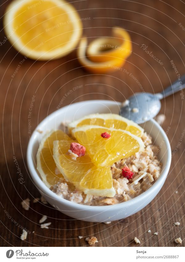 Breakfast with muesli and oranges Food Yoghurt Orange Grain Nutrition Vegetarian diet Diet Fasting Lifestyle Eating Sour To enjoy Healthy Cereal Colour photo