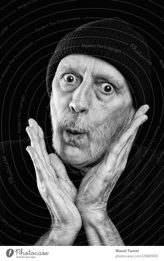 Surprised strong man with a beard and a woolen cap Face To talk Loudspeaker Human being Man Adults Mouth Hand Beard Scream Sadness Crazy Anger Black White