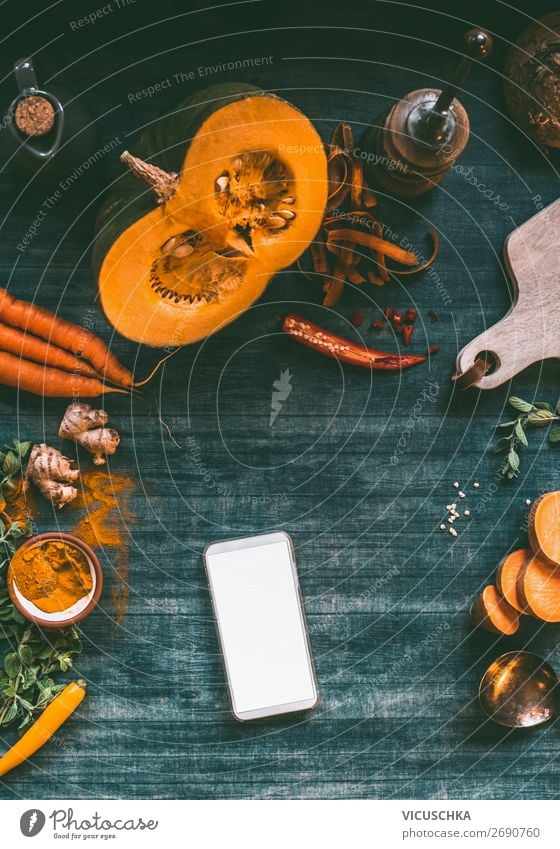 Smartphone on kitchen table with pumpkin Food Vegetable Nutrition Organic produce Vegetarian diet Diet Crockery Shopping Design Healthy Eating Table PDA