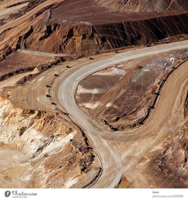 Sharp curves Environment Landscape Earth Sand Summer Beautiful weather Hill Alps Mountain Ore Desert Desert road Transport Traffic infrastructure Rush hour