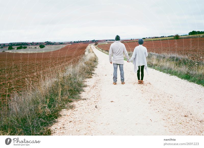 Couple of young people standing and held hands Lifestyle Happy Beautiful Vacation & Travel Trip Adventure Freedom Human being Masculine Feminine Woman Adults