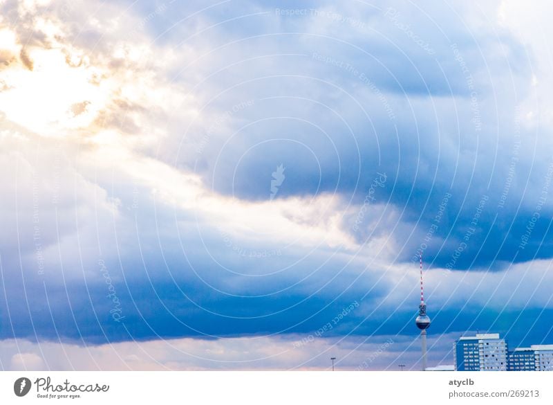 Berlin Drama Town Capital city Downtown Skyline High-rise Tower Manmade structures Television tower Antenna Blue Yellow Anger Aggression Stress Chaos Disaster